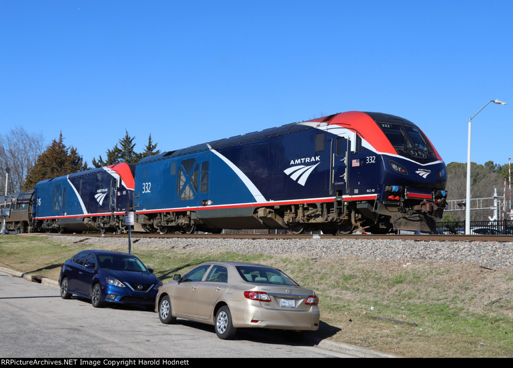 AMTK 332 & 345 lead train P092-05 away from the station